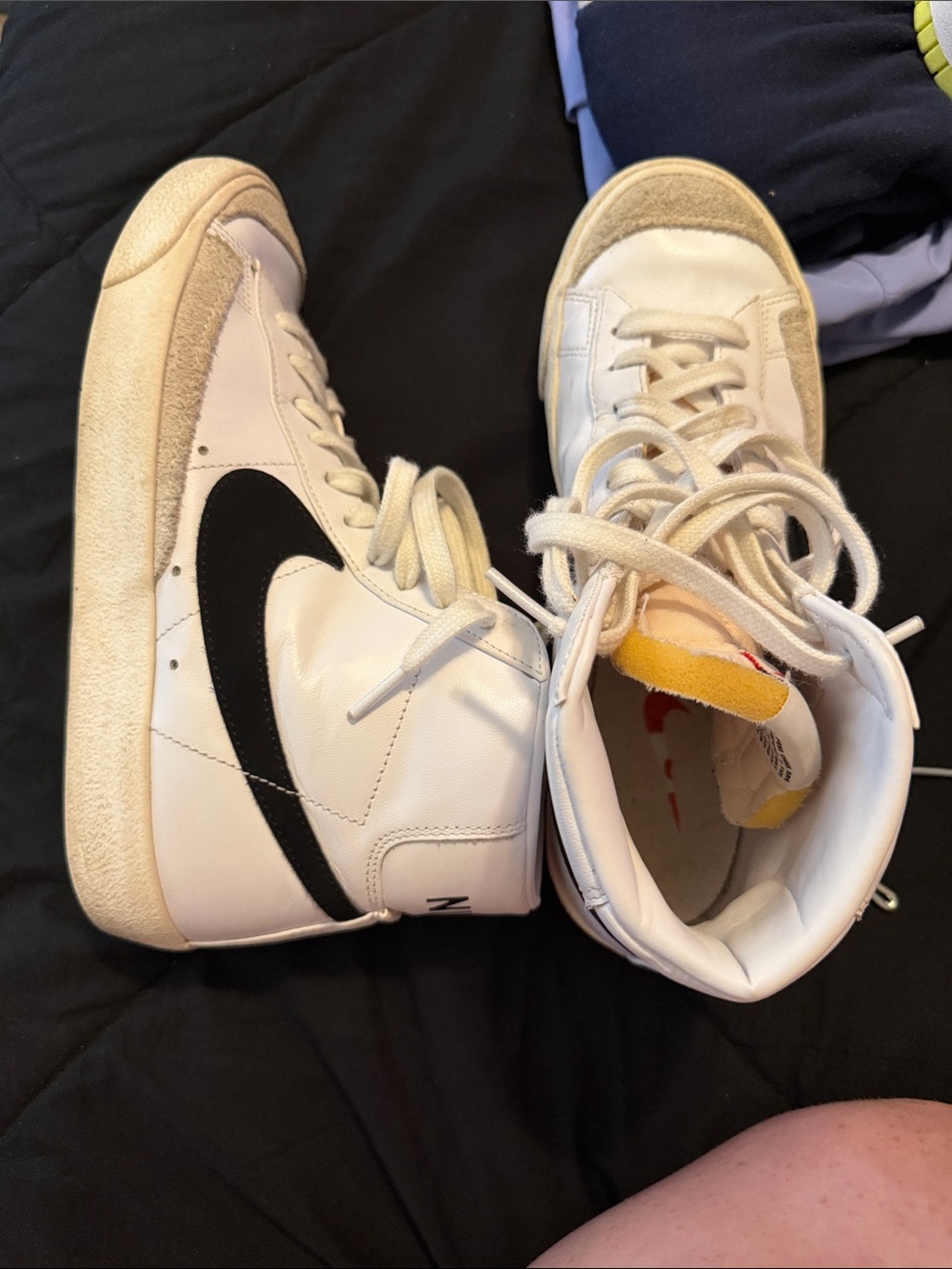 Nike White High-Top Sneakers with Black Swoosh and Yellow Tongue